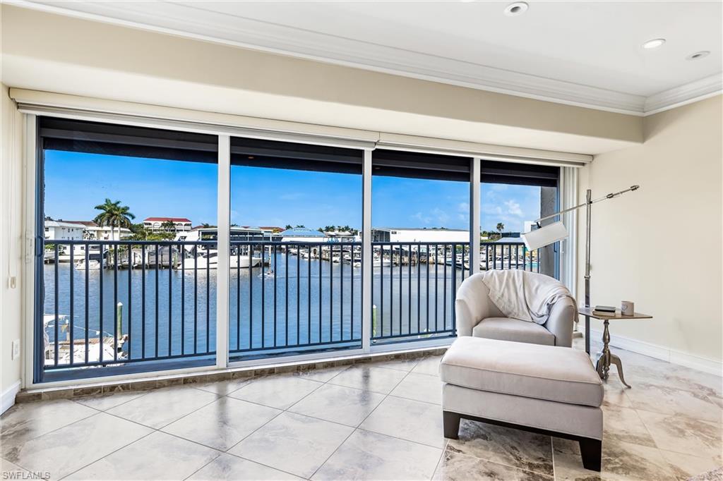 800 River Point Drive, Unit 319 Naples, FL 34102 - Photo 18 of 33 a living room with furniture