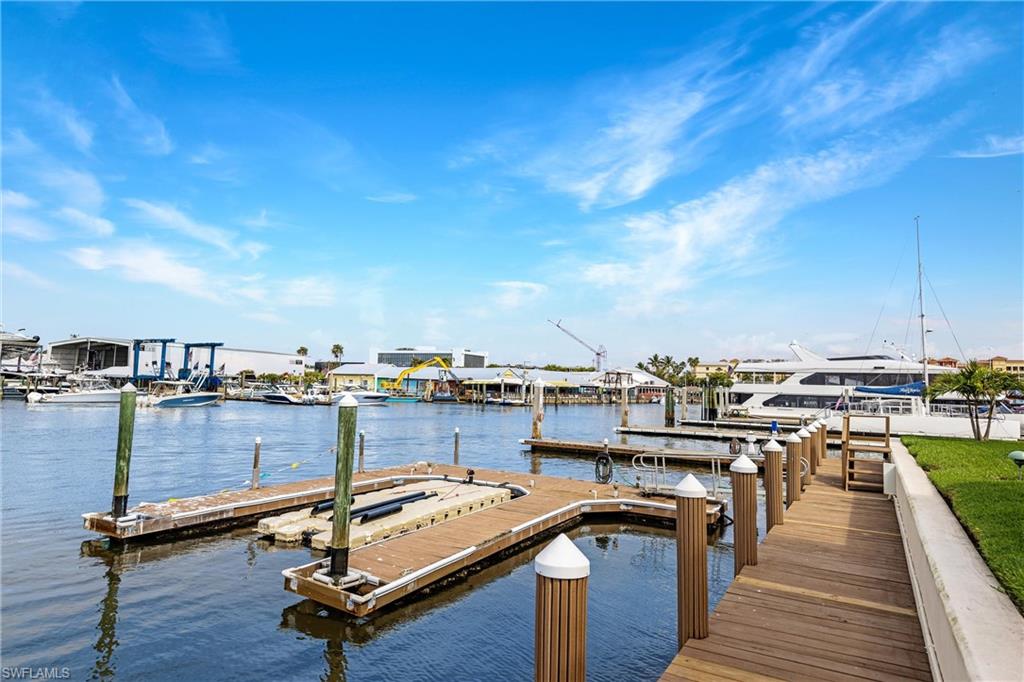 800 River Point Drive, Unit 319 Naples, FL 34102 - Photo 26 of 33 a view of a terrace with sitting area