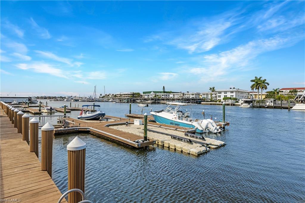 800 River Point Drive, Unit 319 Naples, FL 34102 - Photo 27 of 33 a view of a terrace with seating area
