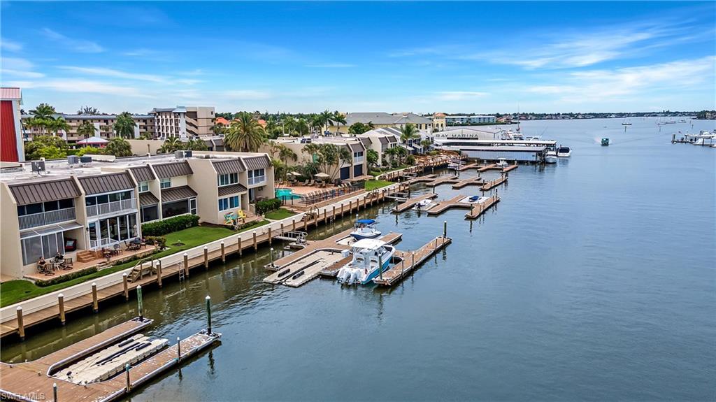 800 River Point Drive, Unit 319 Naples, FL 34102 - Photo 31 of 33 a view of a city with tall buildings