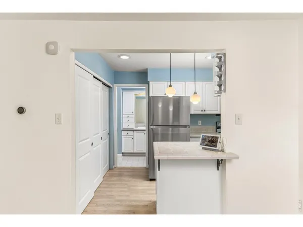 a bathroom with a tub and shower