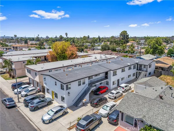 a view of a house with patio and deck
