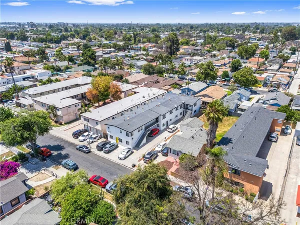 an aerial view of a city with lots of residential buildings