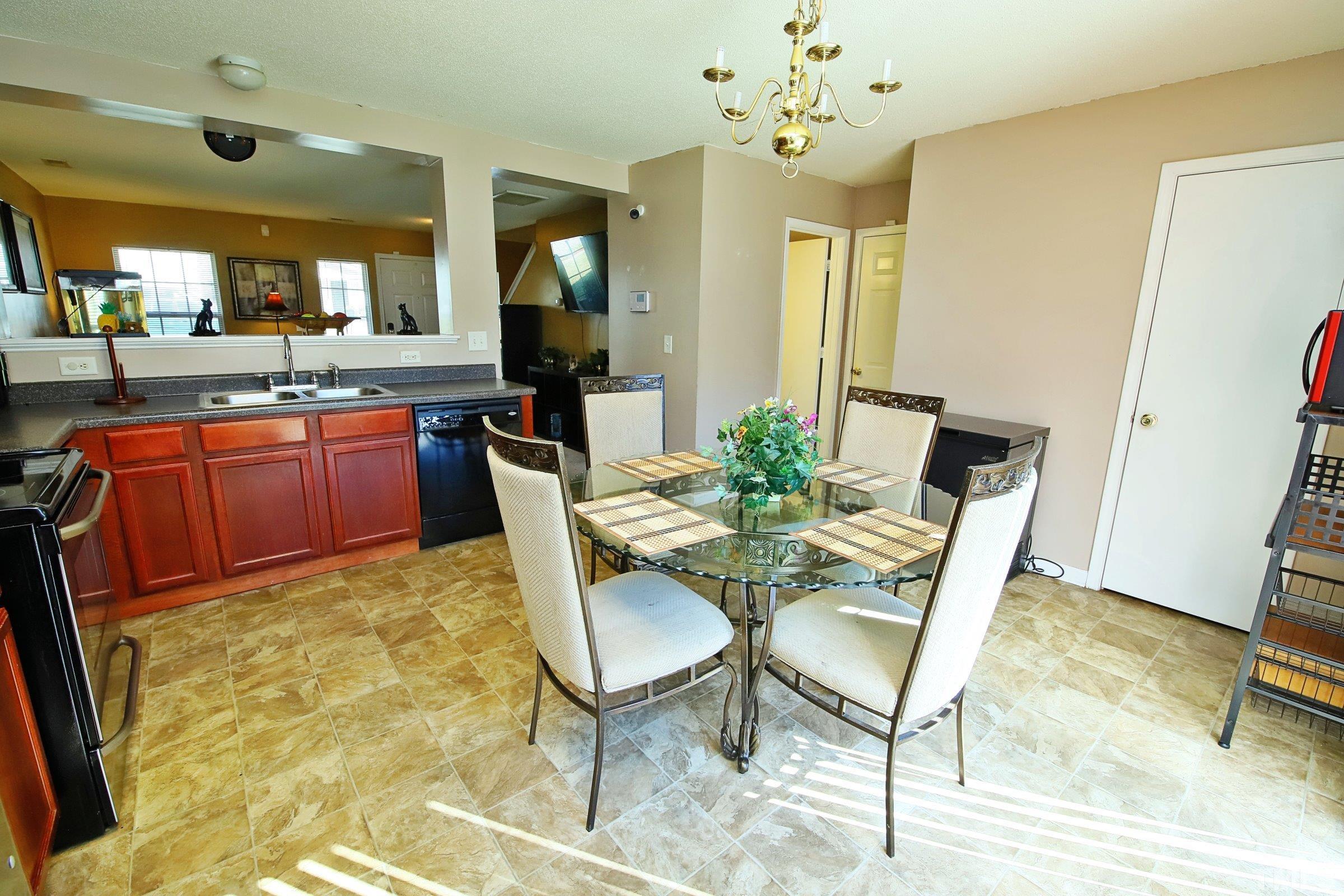 3816 Tryon Ridge Drive Raleigh, NC 27610 - Photo 17 of 28 a view of a dining room with furniture
