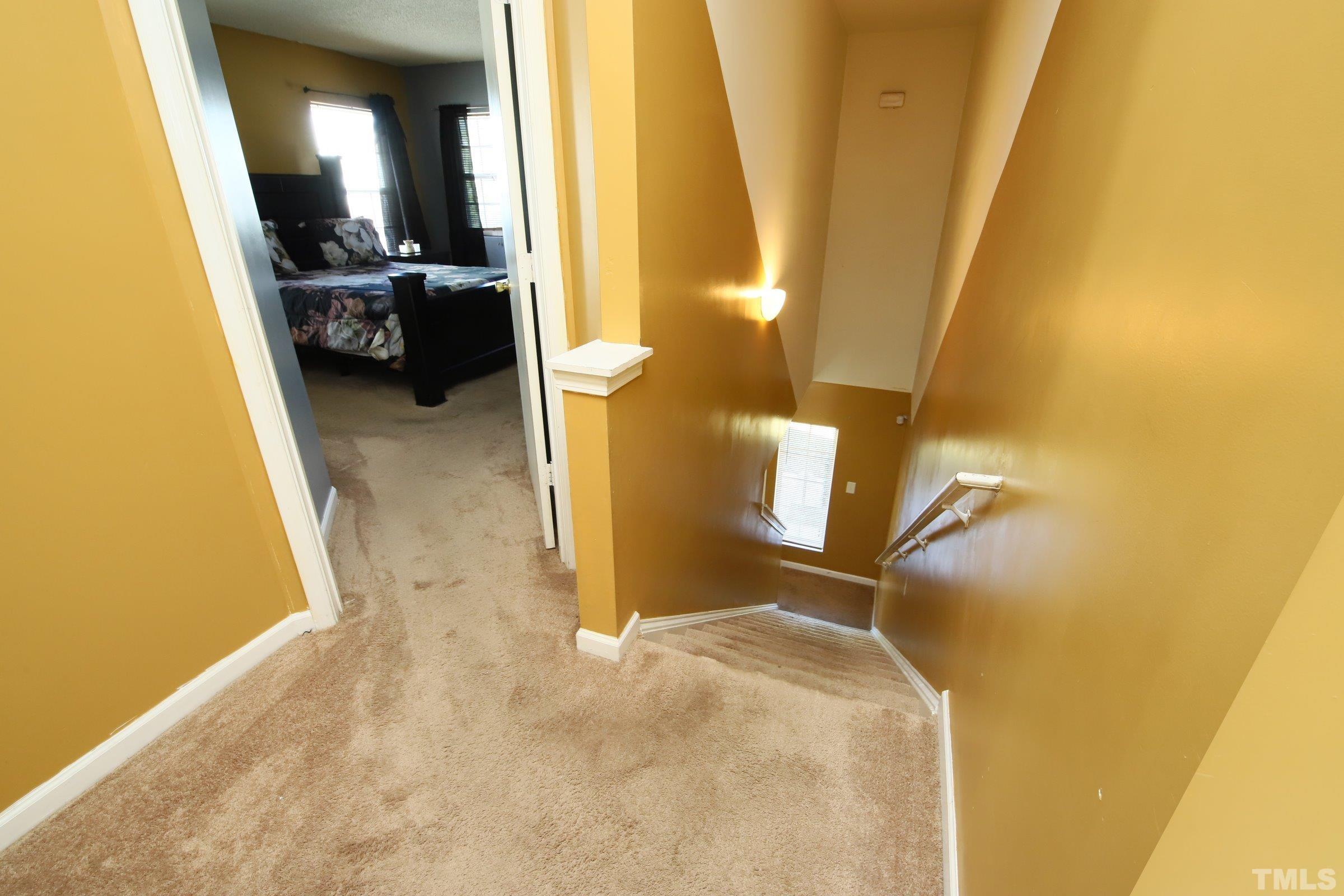 3816 Tryon Ridge Drive Raleigh, NC 27610 - Photo 20 of 28 a en suite bathroom with a granite countertop sink and a mirror