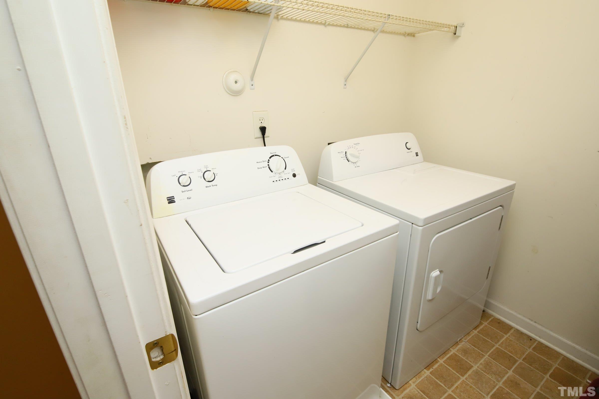 3816 Tryon Ridge Drive Raleigh, NC 27610 - Photo 27 of 28 a utility room with dryer and washer