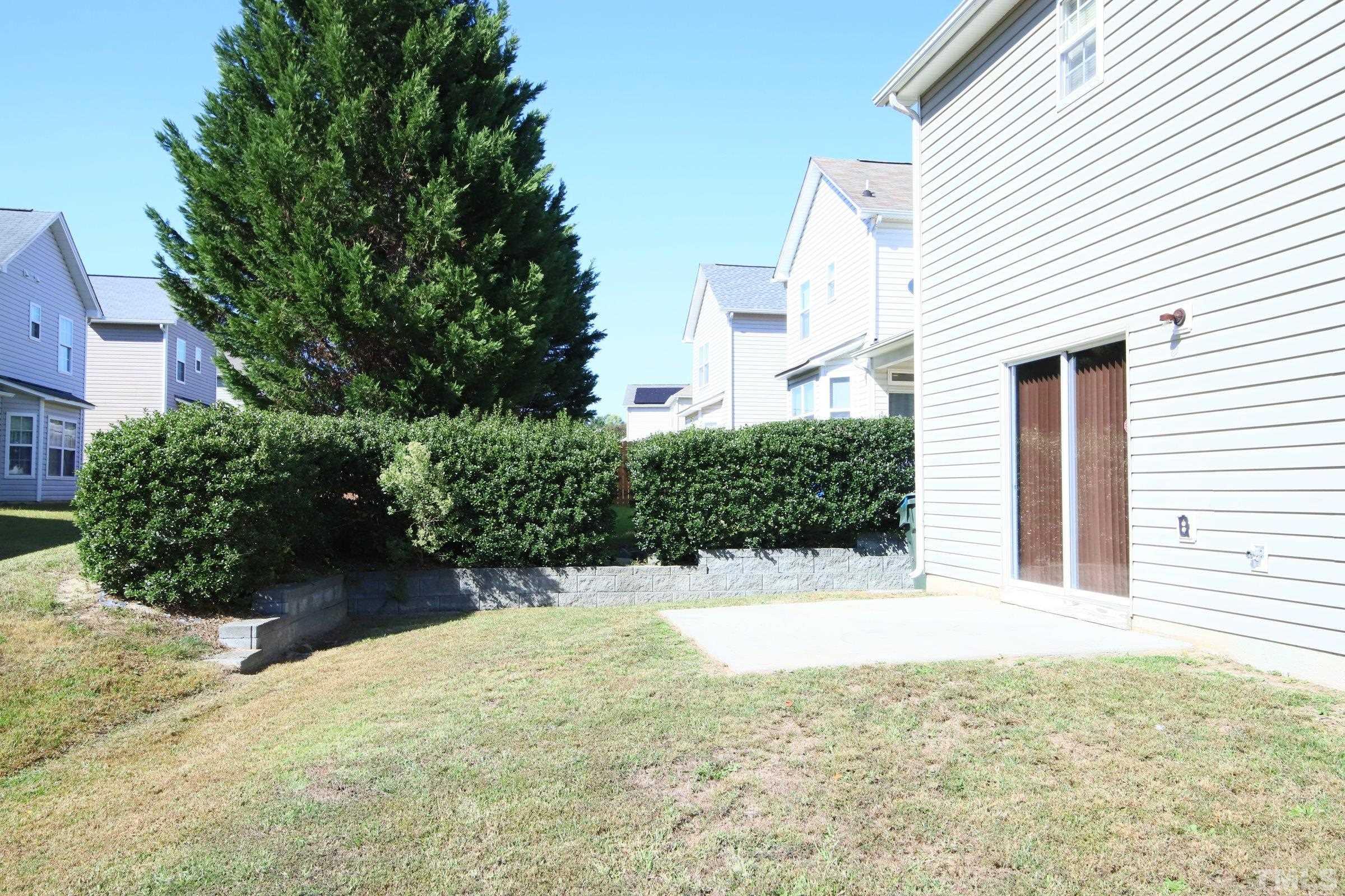 3816 Tryon Ridge Drive Raleigh, NC 27610 - Photo 7 of 28 a view of a backyard of the house