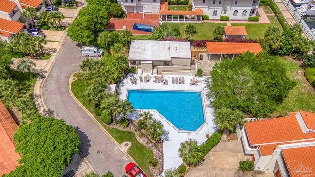 an aerial view of a house with outdoor space