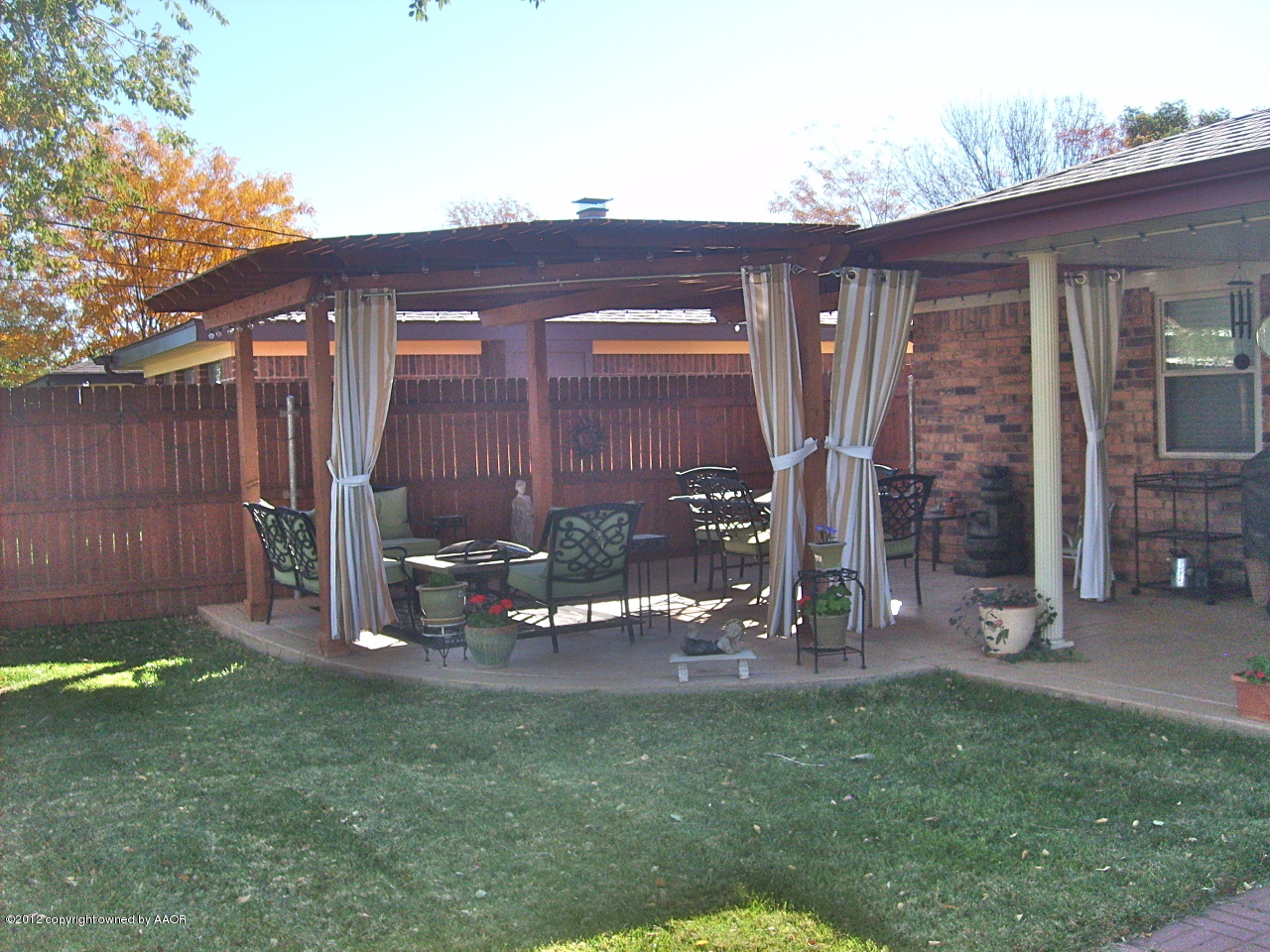 4814 Tulip Avenue Amarillo, TX 79110 - Photo 26 of 27 a view of a house with a yard