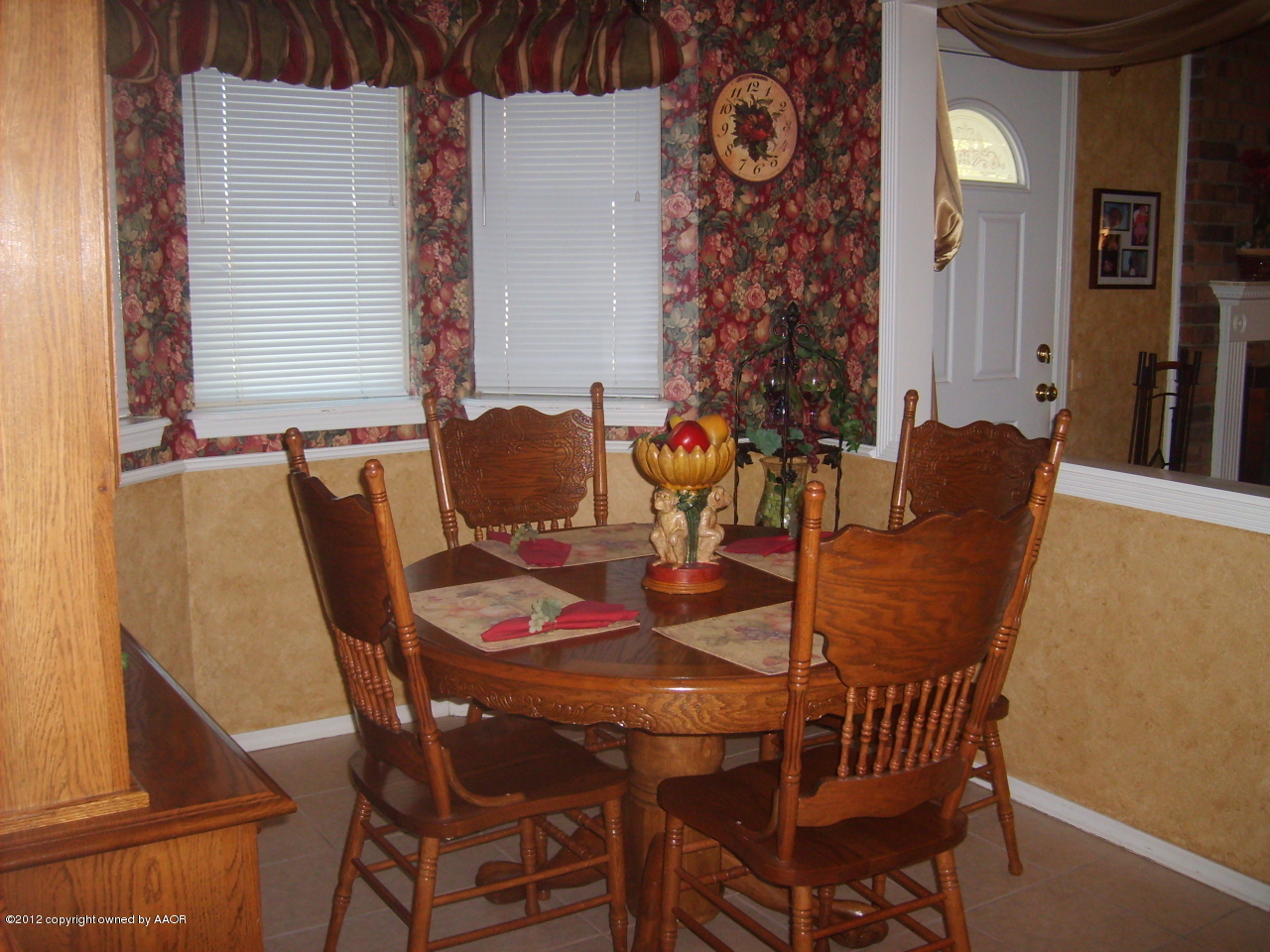 4814 Tulip Avenue Amarillo, TX 79110 - Photo 4 of 27 a dining room with furniture and wooden floor