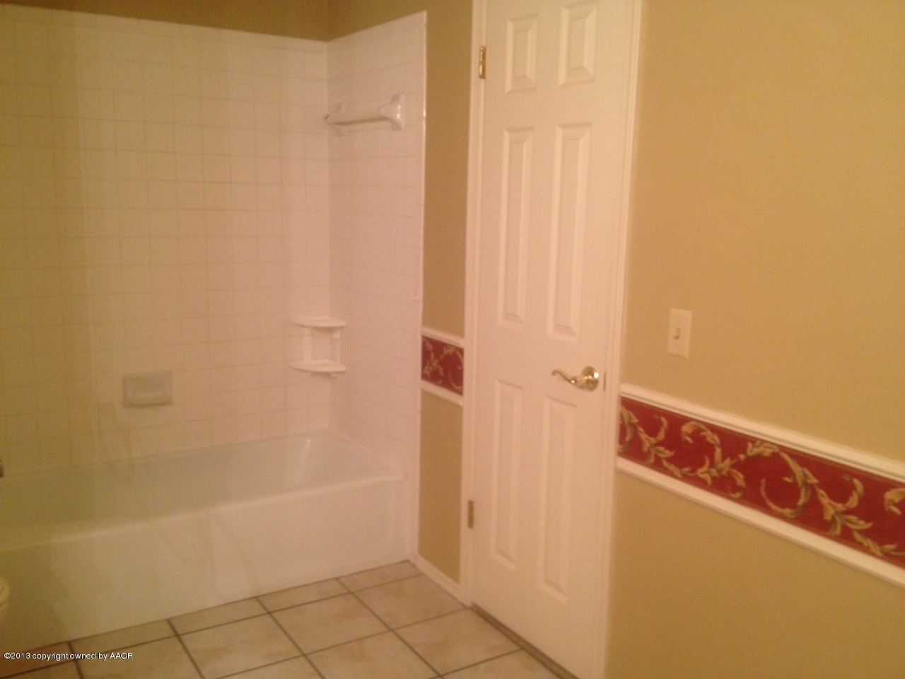 4814 Tulip Avenue Amarillo, TX 79110 - Photo 7 of 27 a bathroom with a bathtub