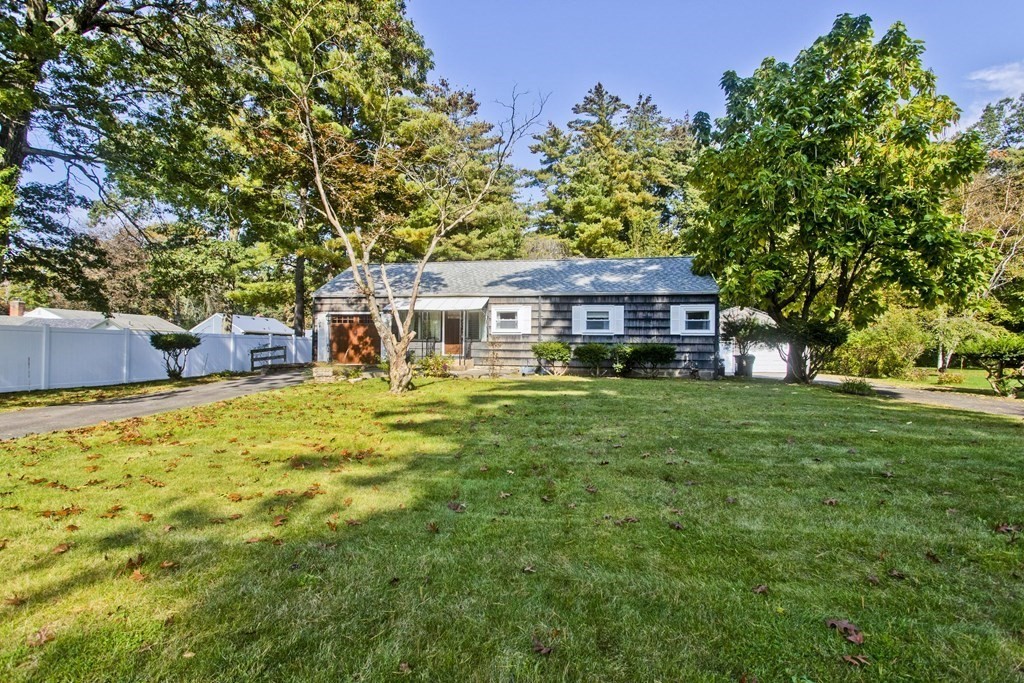 520 Dutchess Street Springfield, MA 01129 - Photo 1 of 31 a view of a house with a big yard and large trees