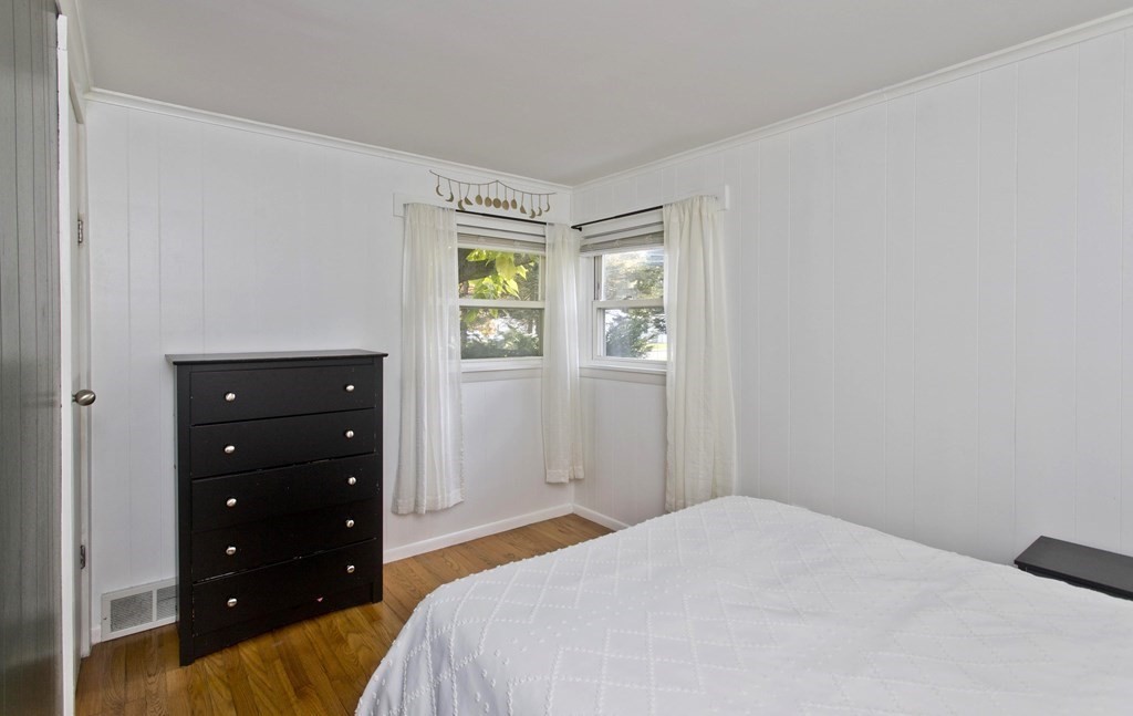 520 Dutchess Street Springfield, MA 01129 - Photo 21 of 31 a bedroom with a bed and a window