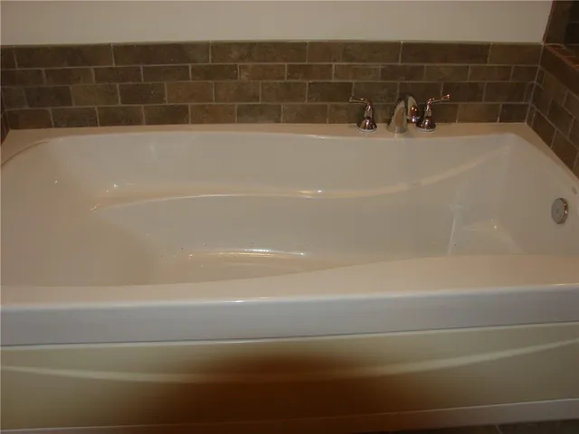 a bathroom with a bathtub