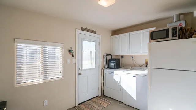 a outdoor living area with furniture and a window