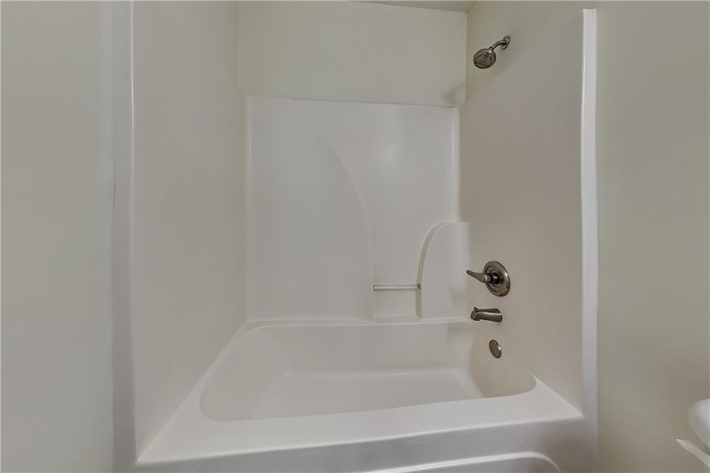 1595 Stephens Pond View Loganville, GA 30052 - Photo 17 of 22 a close view of a bathtub in bathroom