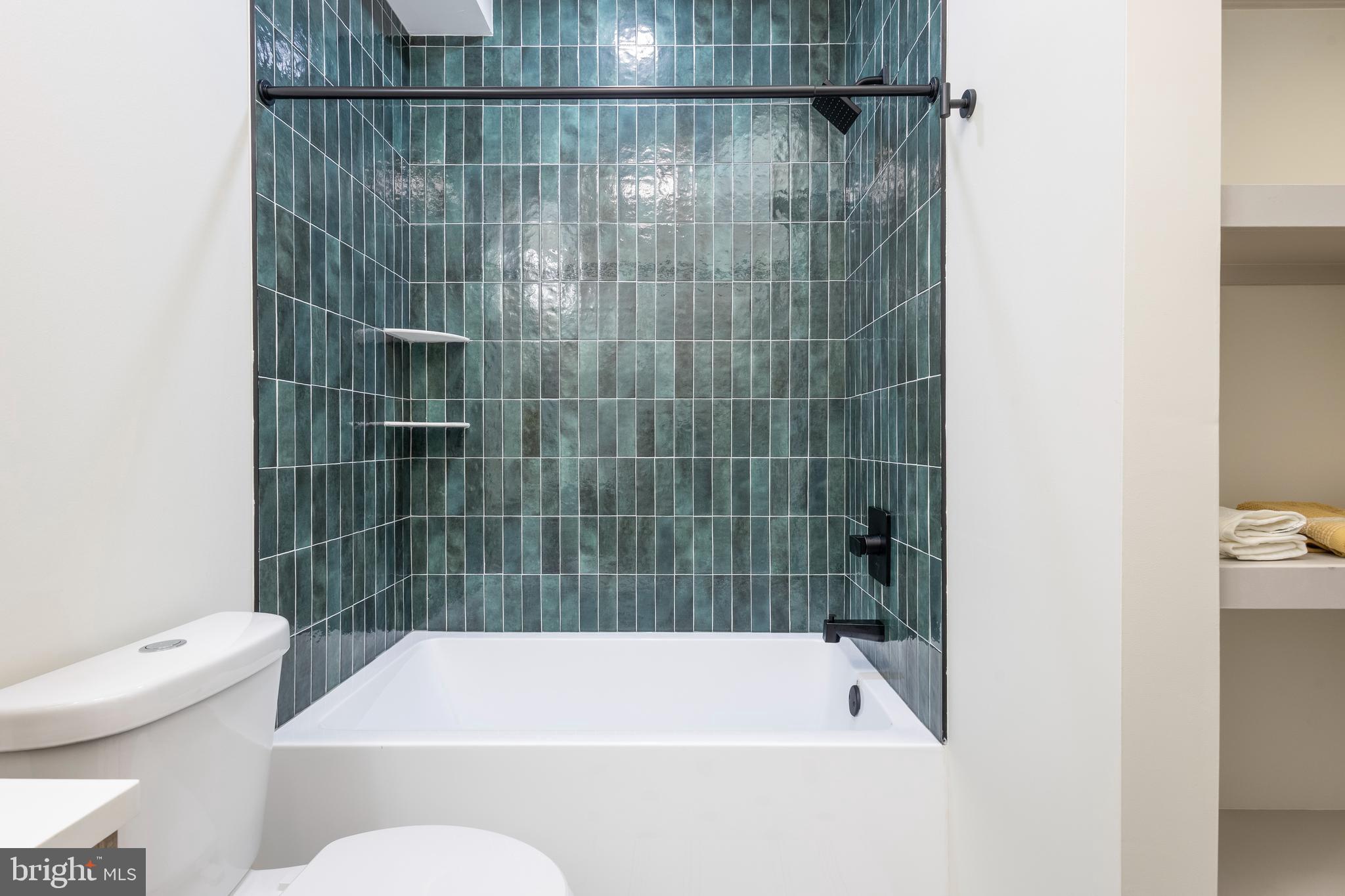 3116 Clifford Street, Unit B Philadelphia, PA 19121 - Photo 13 of 32 a bathroom with a bath tub