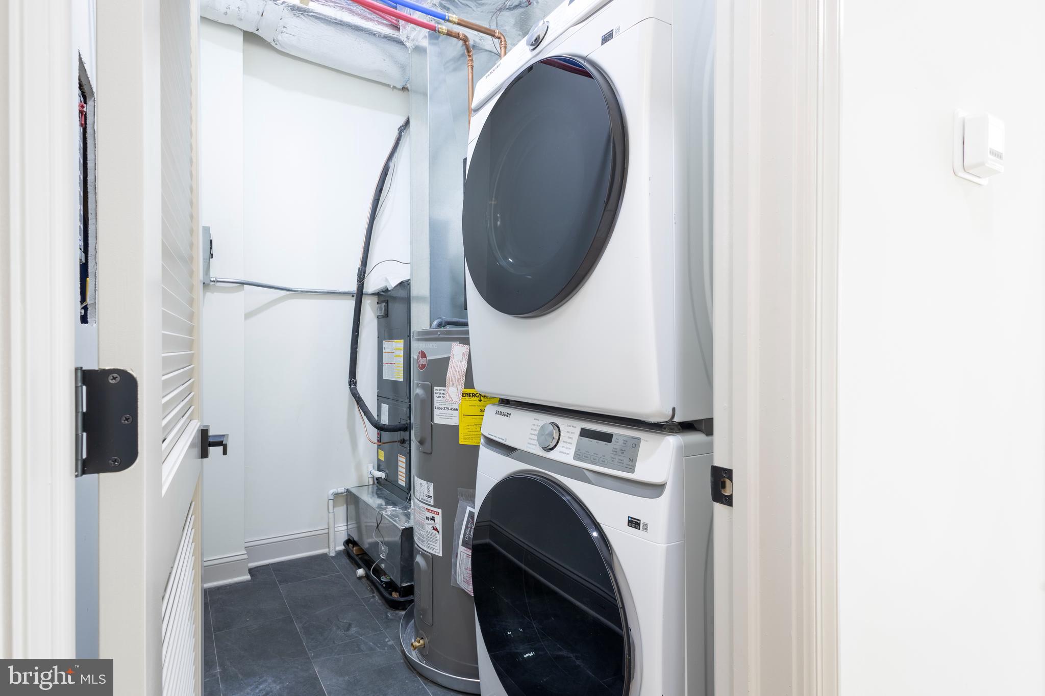 3116 Clifford Street, Unit B Philadelphia, PA 19121 - Photo 22 of 32 a utility room with dryer and washer