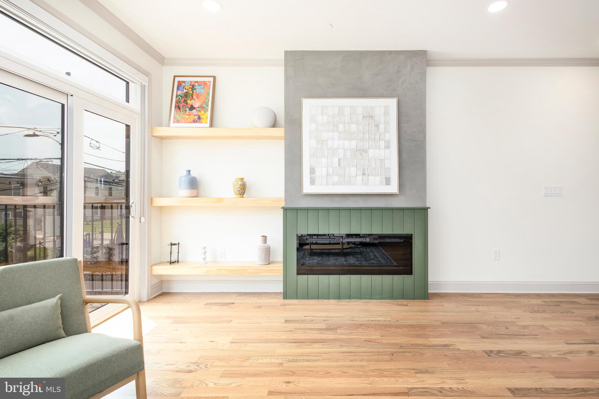 3116 Clifford Street, Unit B Philadelphia, PA 19121 - Photo 5 of 32 a living room with furniture and a fireplace