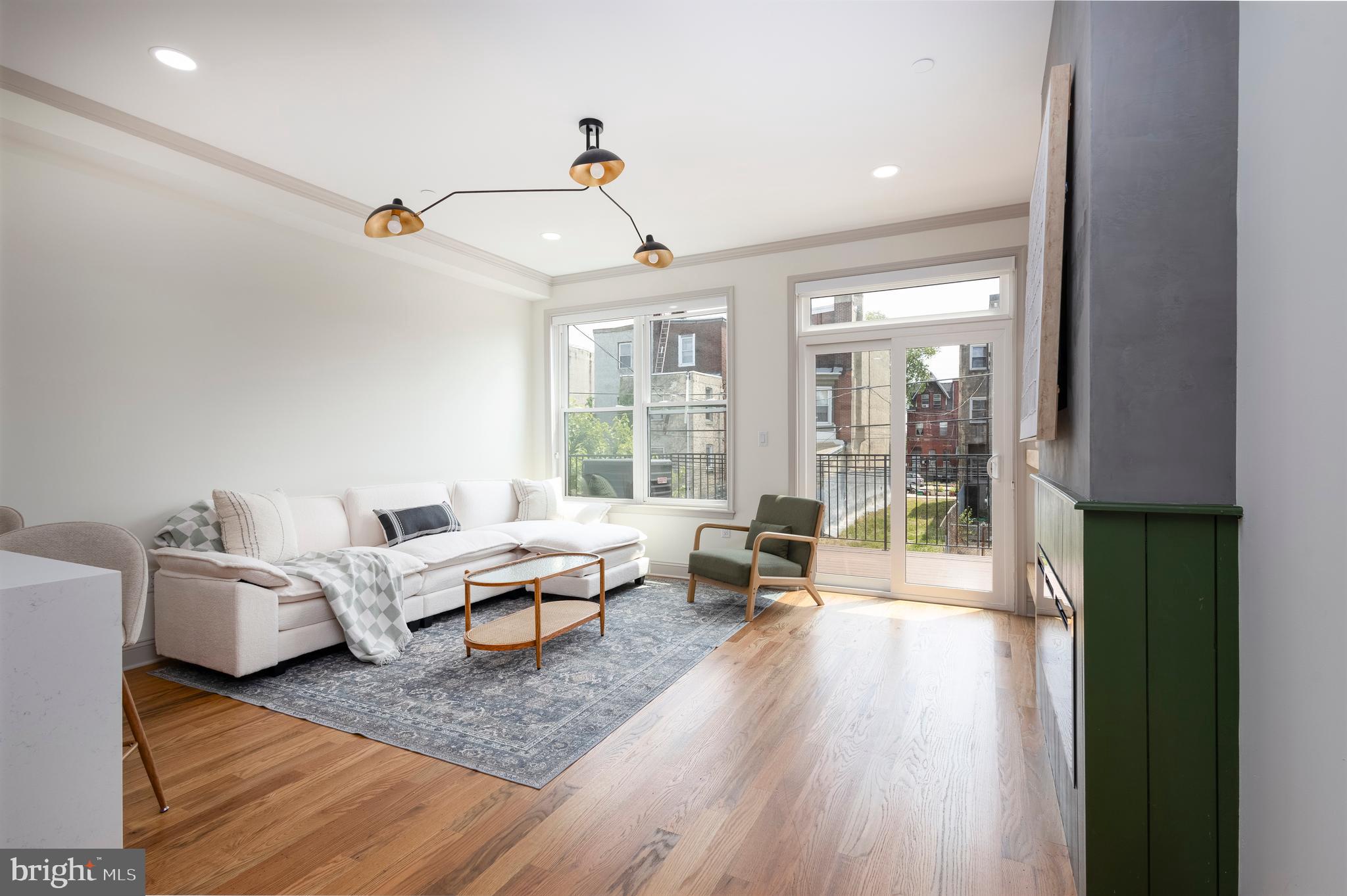 3116 Clifford Street, Unit B Philadelphia, PA 19121 - Photo 6 of 32 a living room with furniture and wooden floor