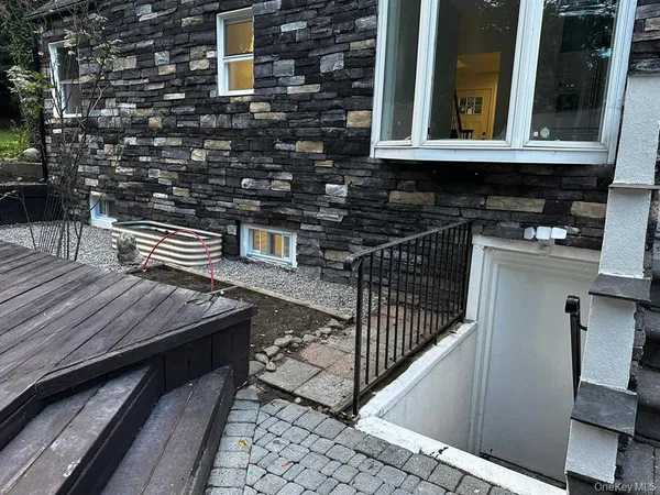 a view of sitting area in front of building