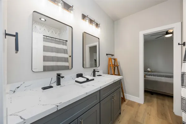 a bathroom with a bathtub and shower