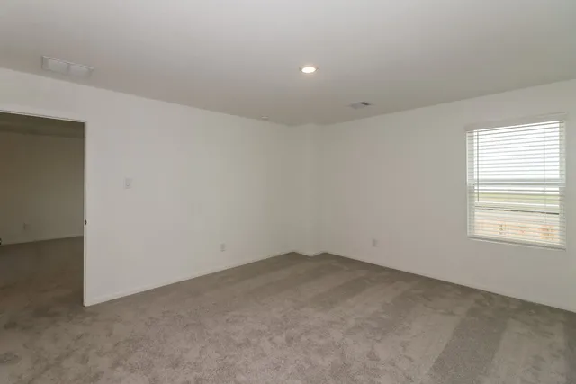 an empty room with a window