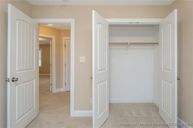 a view of a bathroom with a glass door