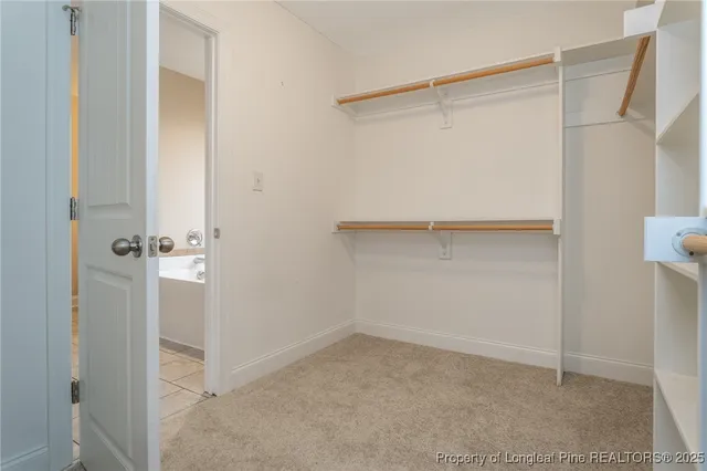 a view of an empty walk in closet