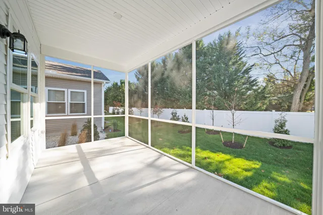 a view of swimming pool with a yard and sitting area