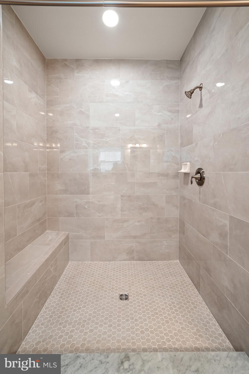 33766 Catching Cove Lewes, DE 19958 - Photo 24 of 47 a bathroom with a shower