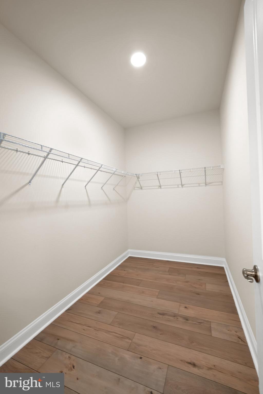 33766 Catching Cove Lewes, DE 19958 - Photo 25 of 47 a view of a room with racks on the wall