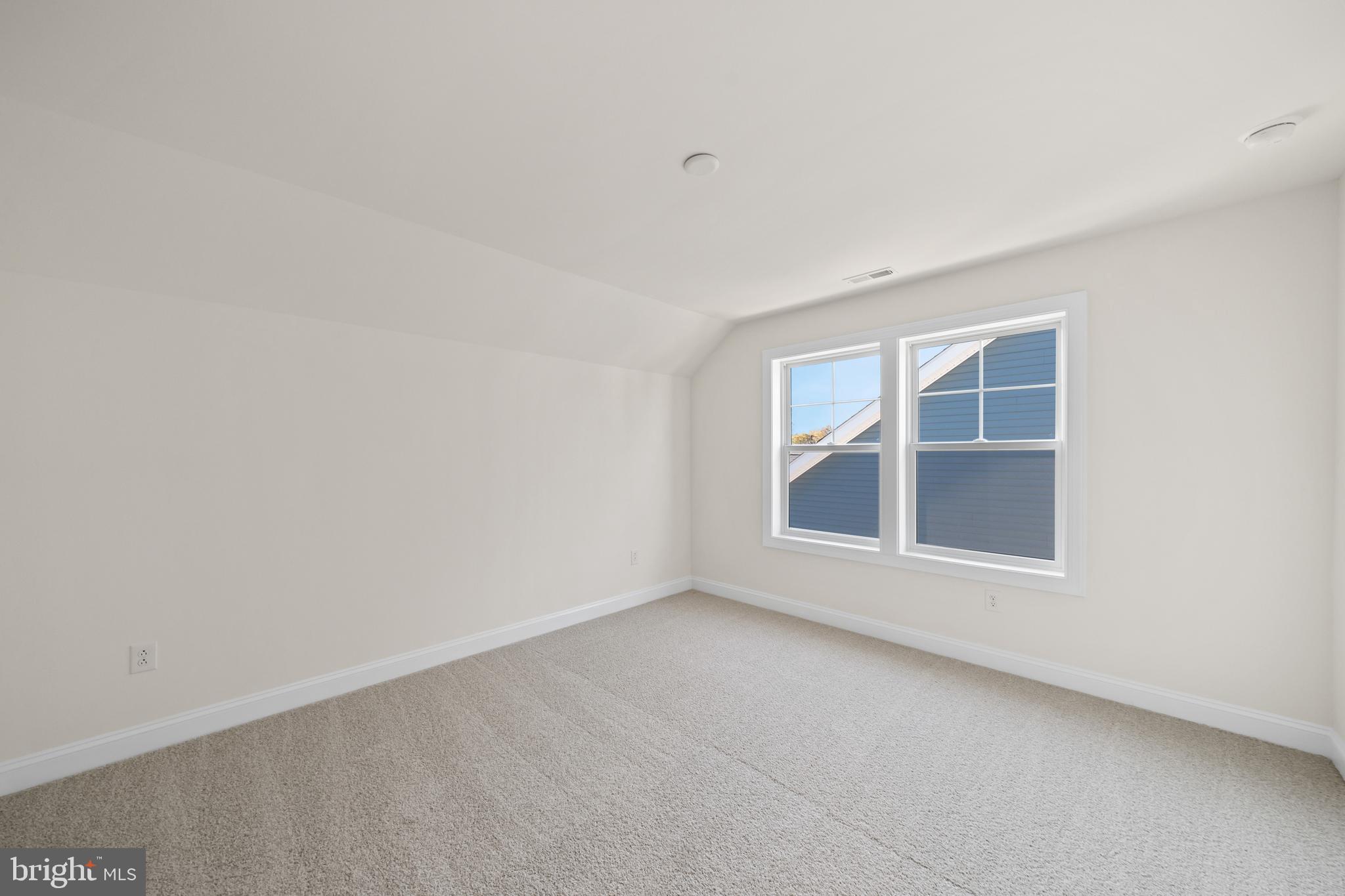 33766 Catching Cove Lewes, DE 19958 - Photo 33 of 47 an empty room with a window