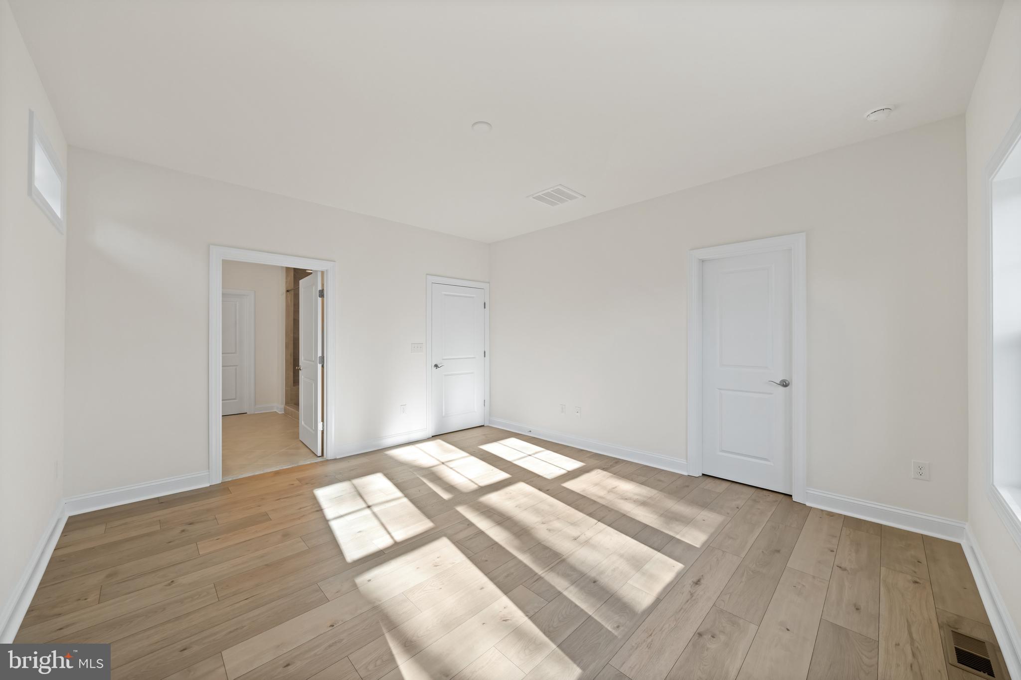 33766 Catching Cove Lewes, DE 19958 - Photo 37 of 47 a view of an empty room and wooden floor