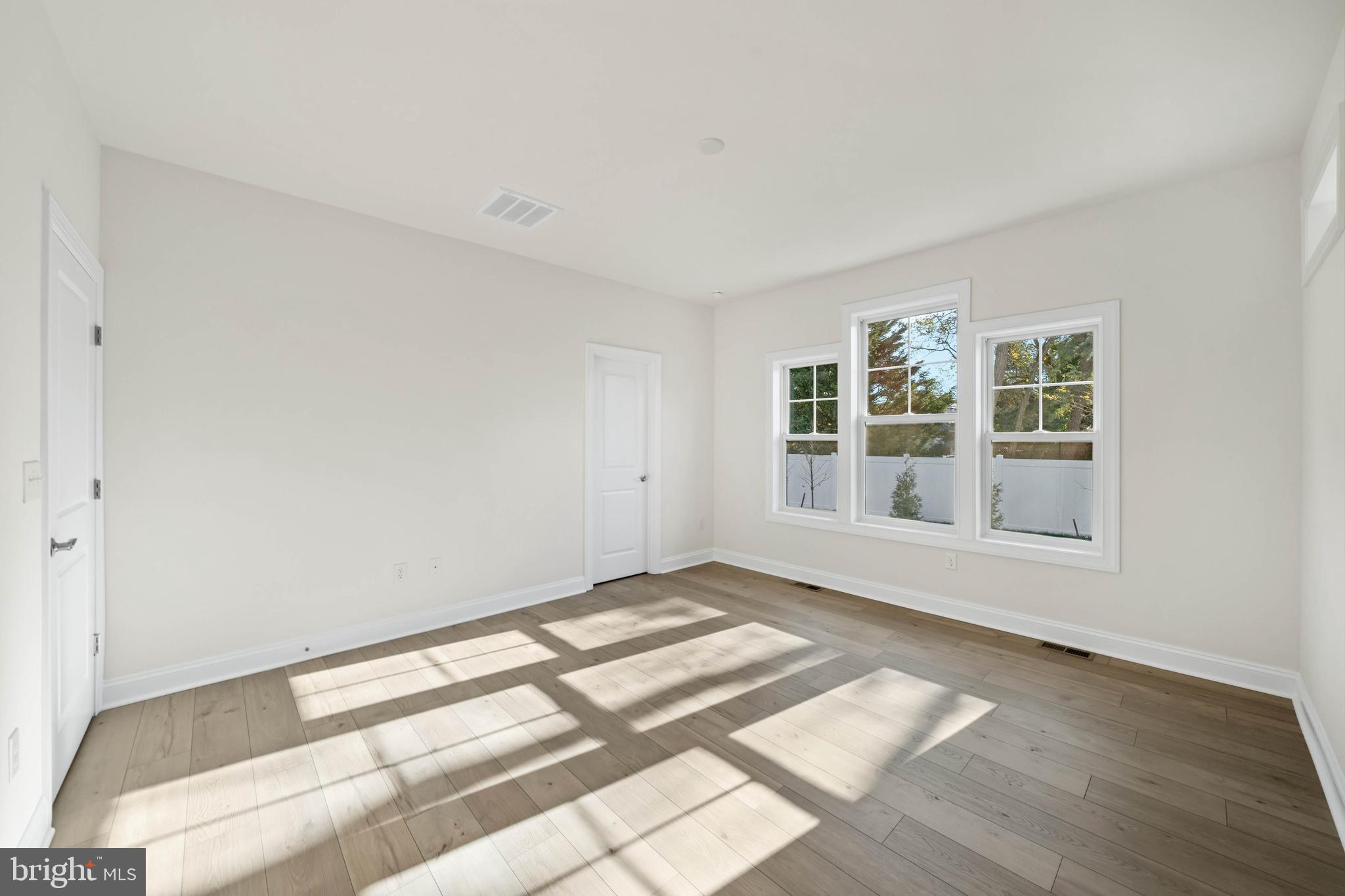 33766 Catching Cove Lewes, DE 19958 - Photo 38 of 47 a view of an empty room with a window