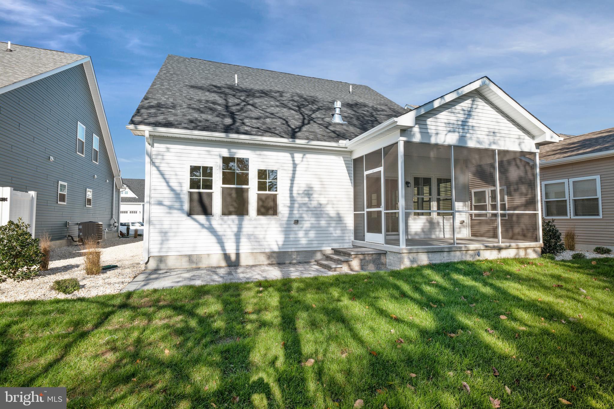33766 Catching Cove Lewes, DE 19958 - Photo 46 of 47 a view of a house with backyard and sitting area