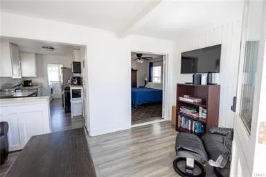 a kitchen with a sink stove and refrigerator
