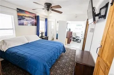 a bathroom with a toilet and shower