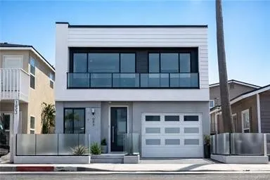 a view of patio with table and chairs and potted plants