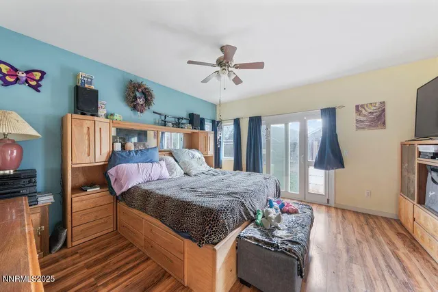 a bathroom with a tub sink mirror and shower