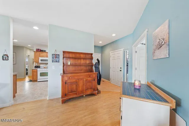 a room with furniture and wooden floor