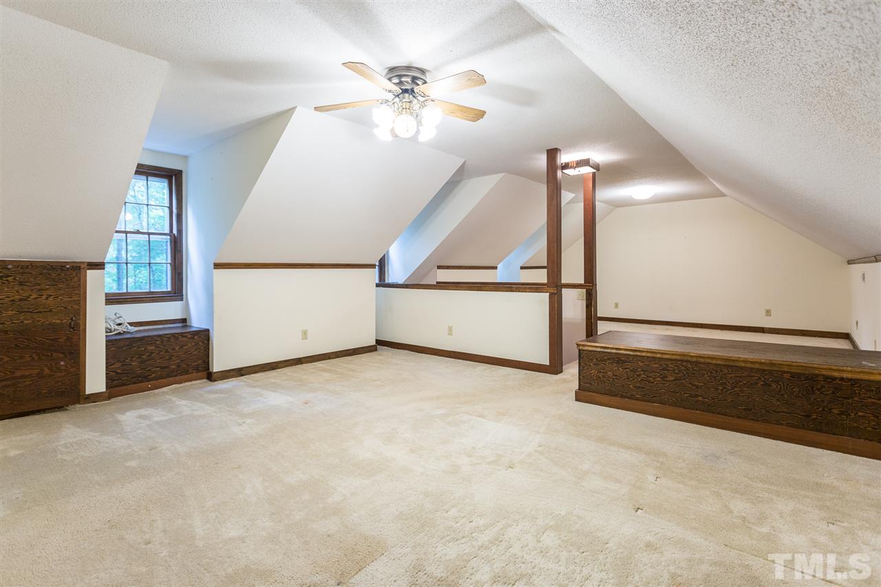 10005 Bavin Place Raleigh, NC 27613 - Photo 21 of 30 a view of an empty room with window