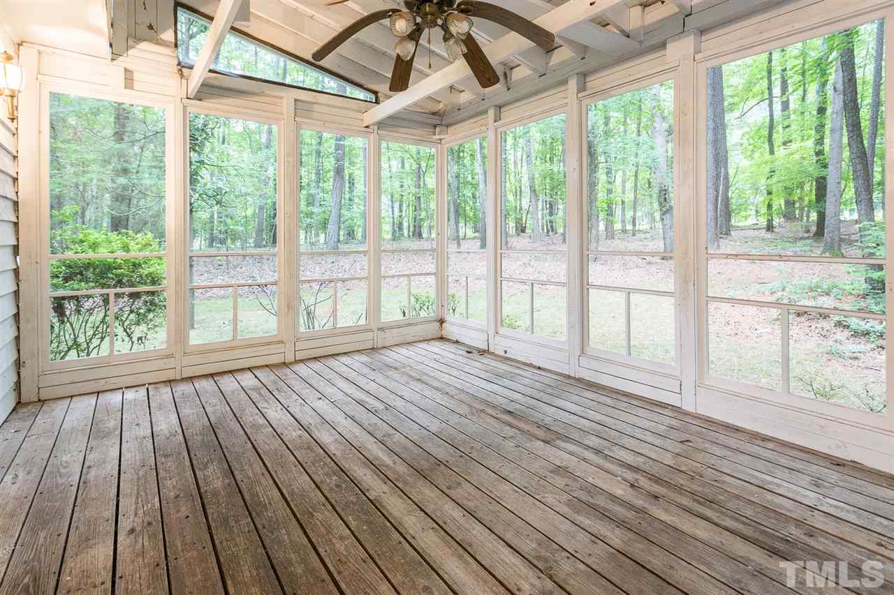 10005 Bavin Place Raleigh, NC 27613 - Photo 23 of 30 a view of a room with wooden floor and walls