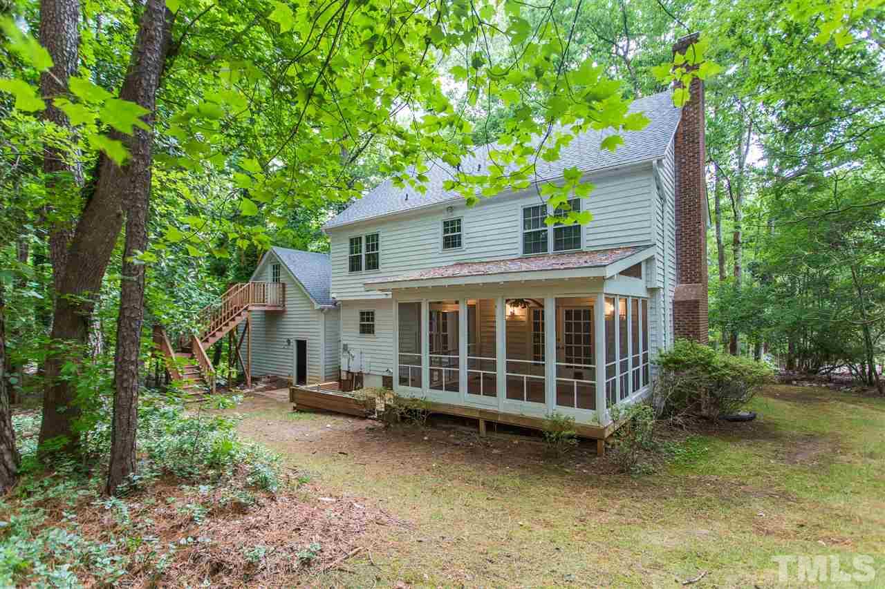 10005 Bavin Place Raleigh, NC 27613 - Photo 26 of 30 a view of a house with a yard