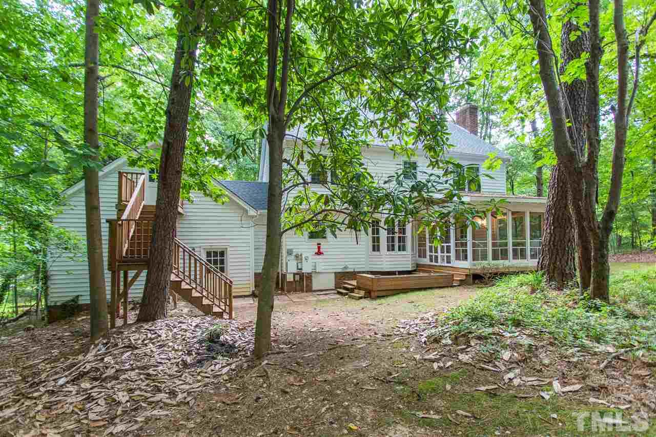 10005 Bavin Place Raleigh, NC 27613 - Photo 27 of 30 a view of a house with backyard and sitting area