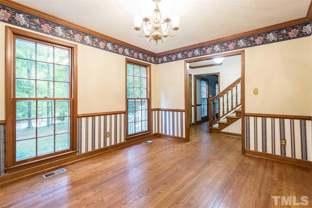 10005 Bavin Place Raleigh, NC 27613 - Photo 6 of 30 a view of entryway with wooden floor