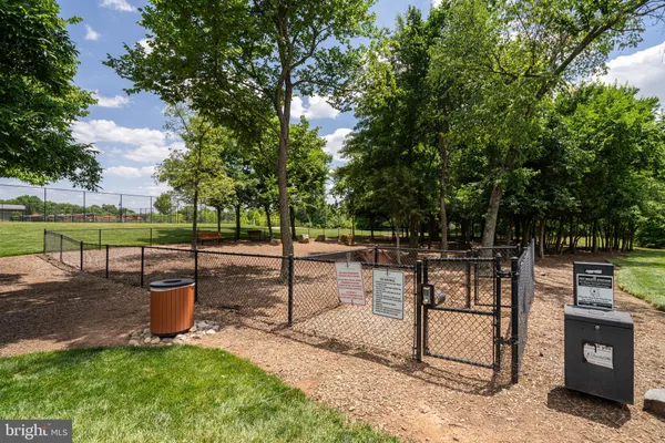 a view of a park with swings