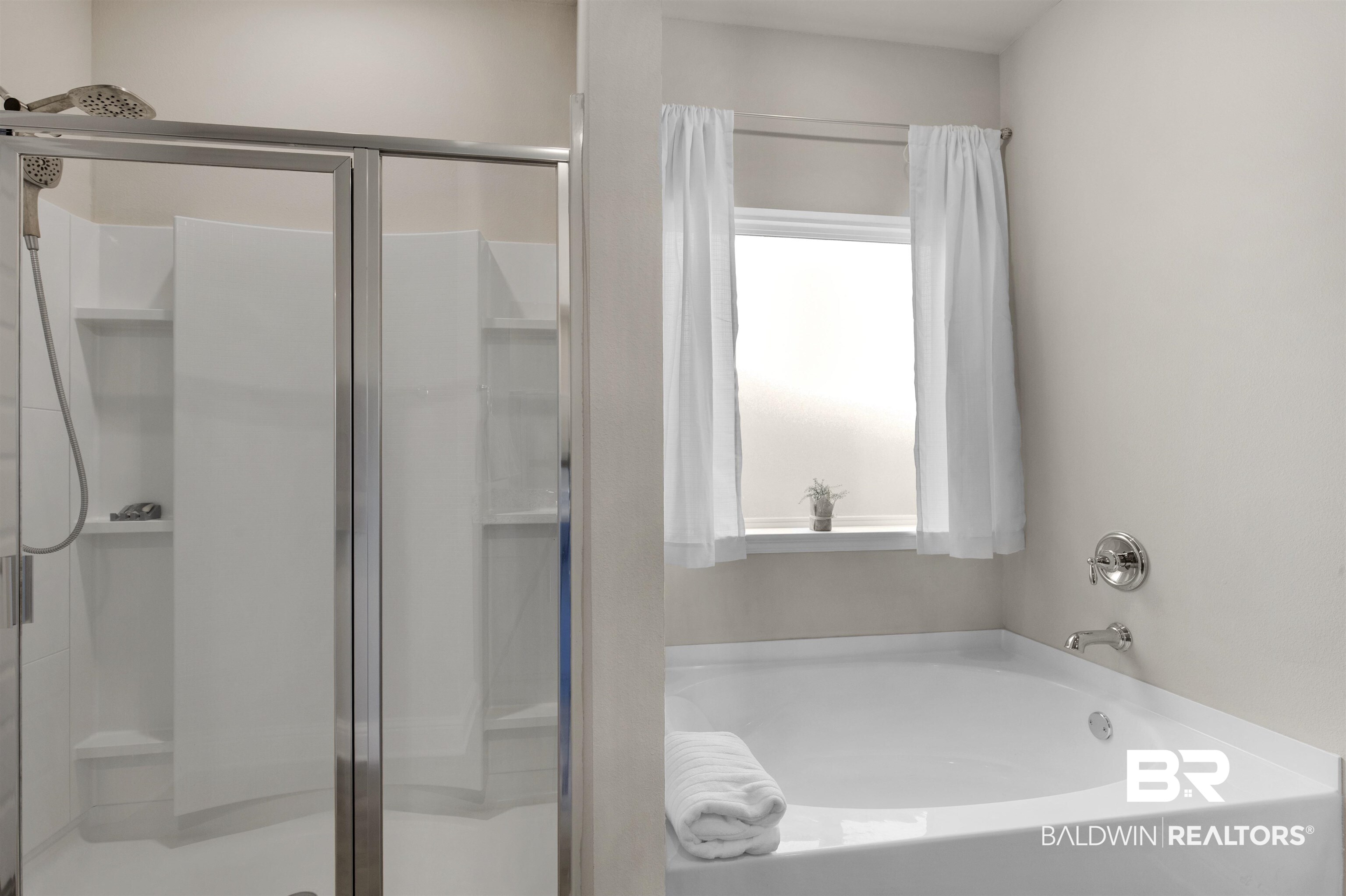 2345 Laurel Street Semmes, AL 36575 - Photo 14 of 31 Bathroom featuring a stall shower and a bath