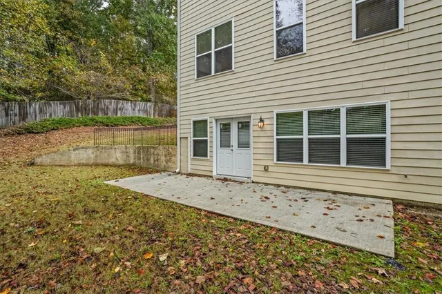a view of a backyard with a small cabin
