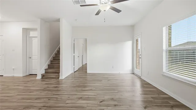 a view of entryway with wooden floor